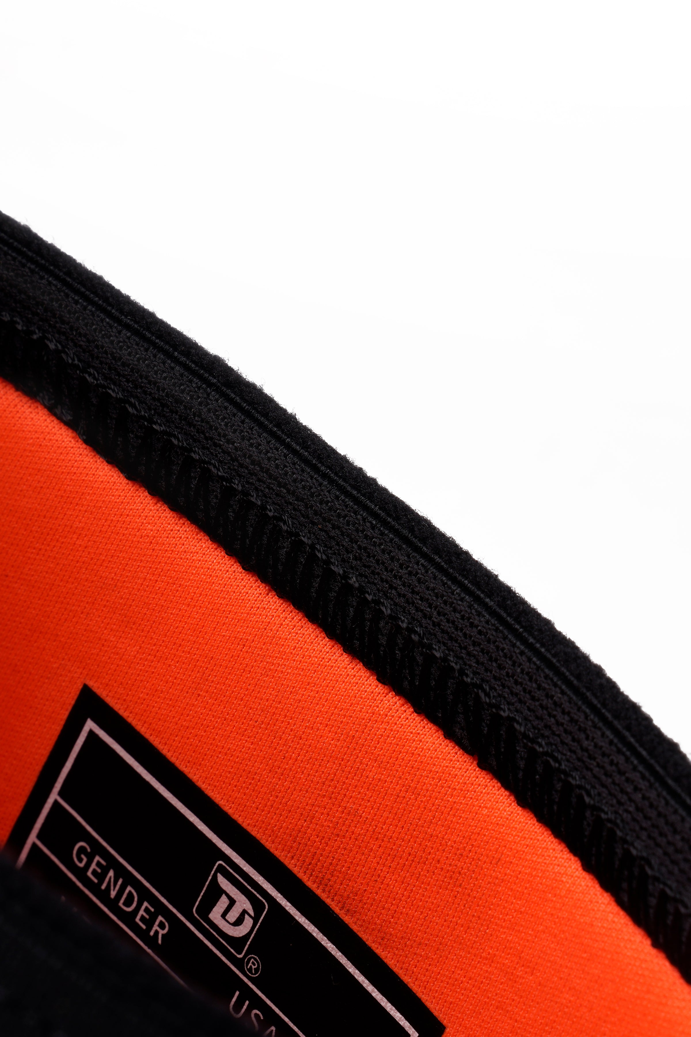 Close-up of Trudave IronShield Series tall waterproof steel toe work boots – blue and black upper with orange lining showing detailed stitching and durable material finish