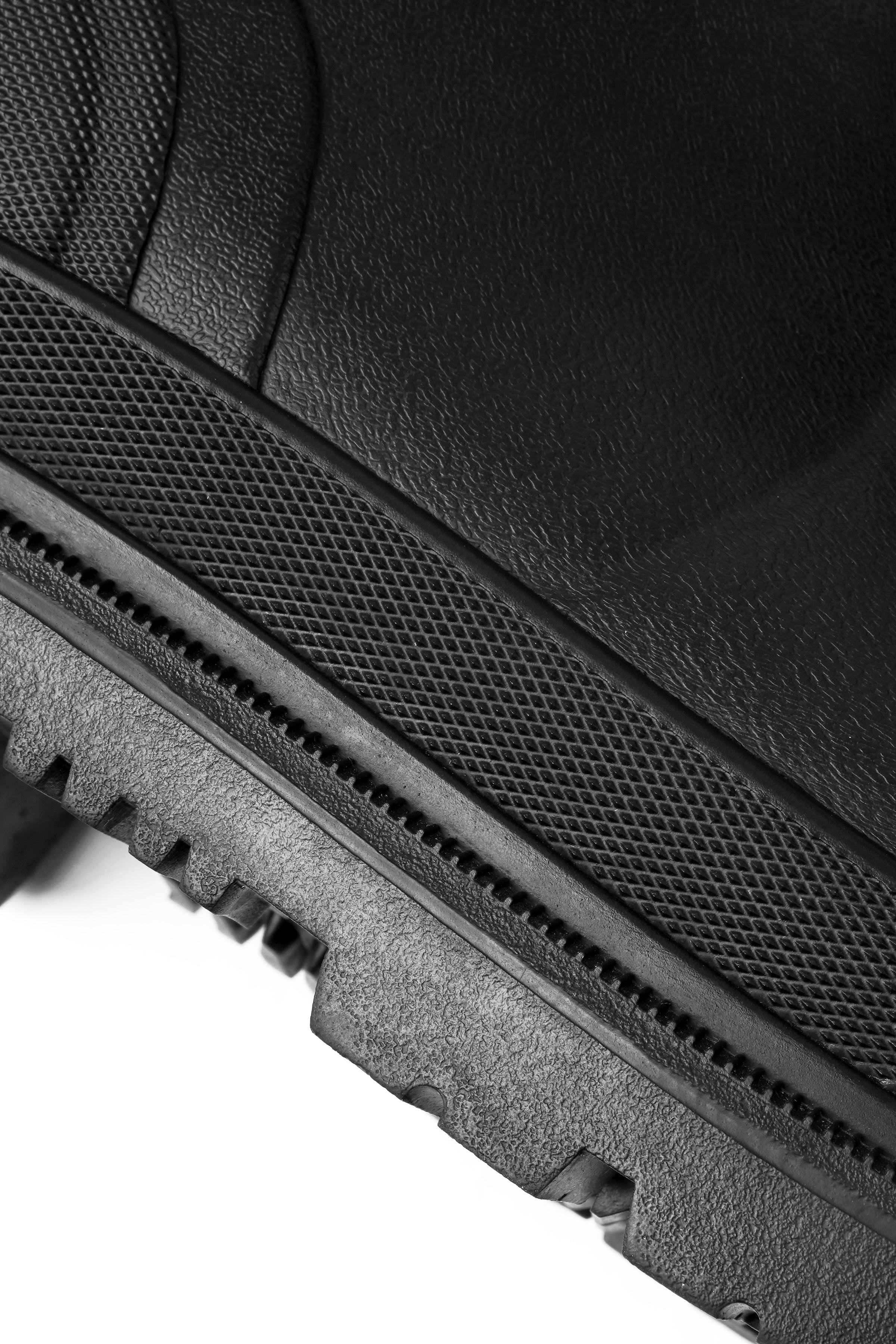 Close-up of Trudave IronShield Series tall waterproof steel toe work boots – blue and black sole and side tread pattern designed for slip resistance and durability on wet job sites