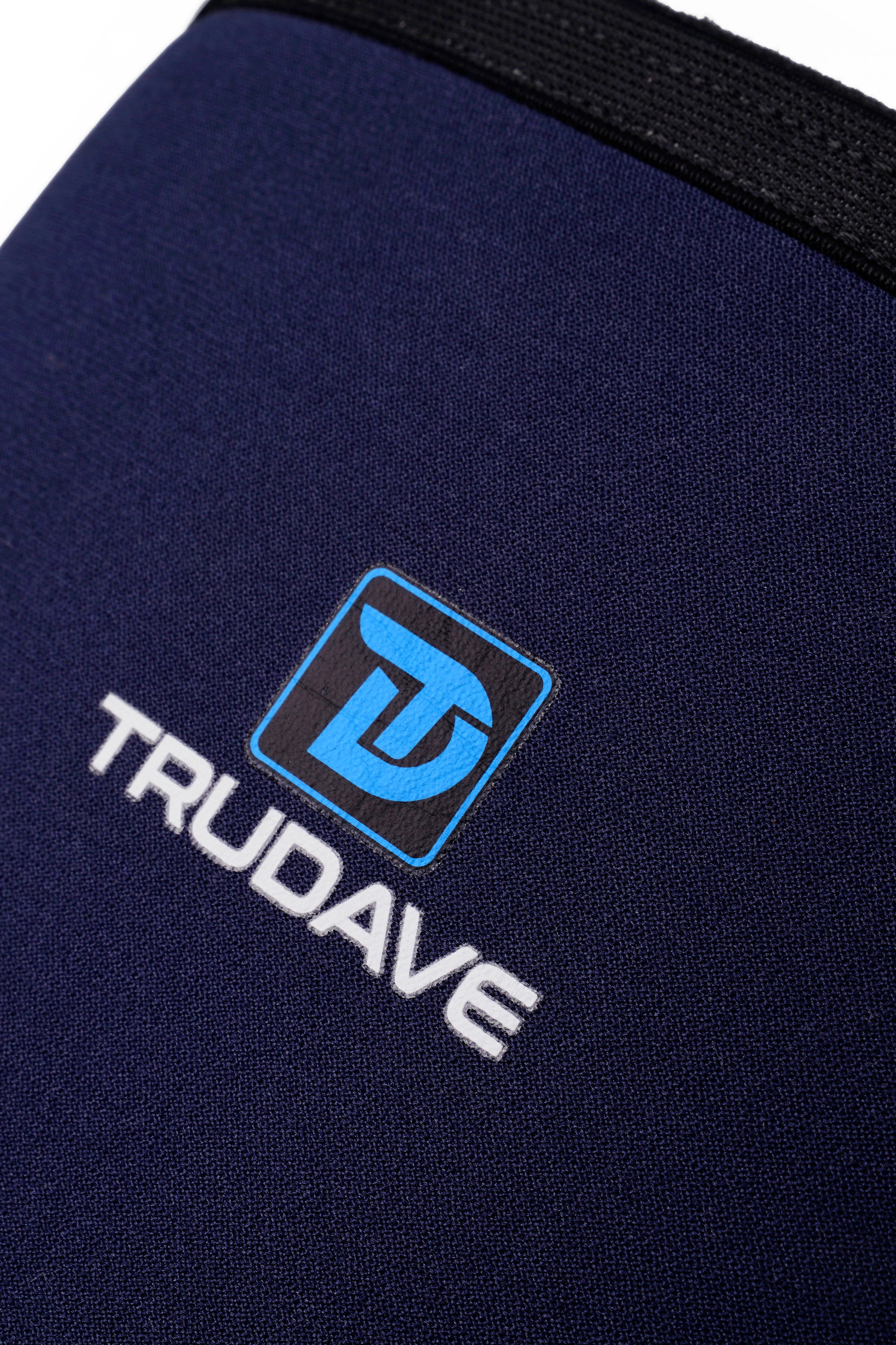 Close-up of TrudaveGear logo on Trudave IronShield Series tall waterproof steel toe work boots – blue and black design highlighting brand craftsmanship and durability